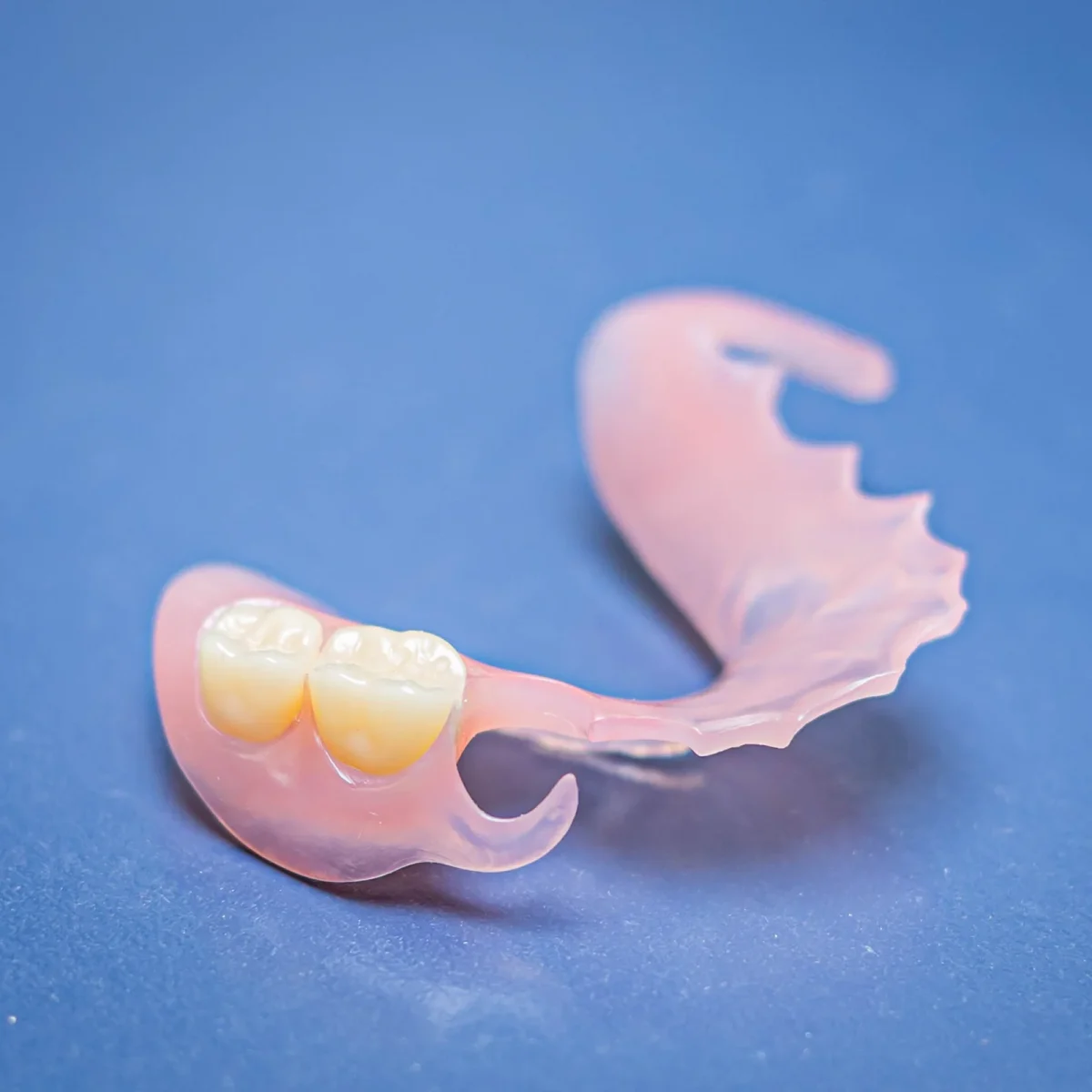 Flexible partial denture with thermoplastic clasp detail