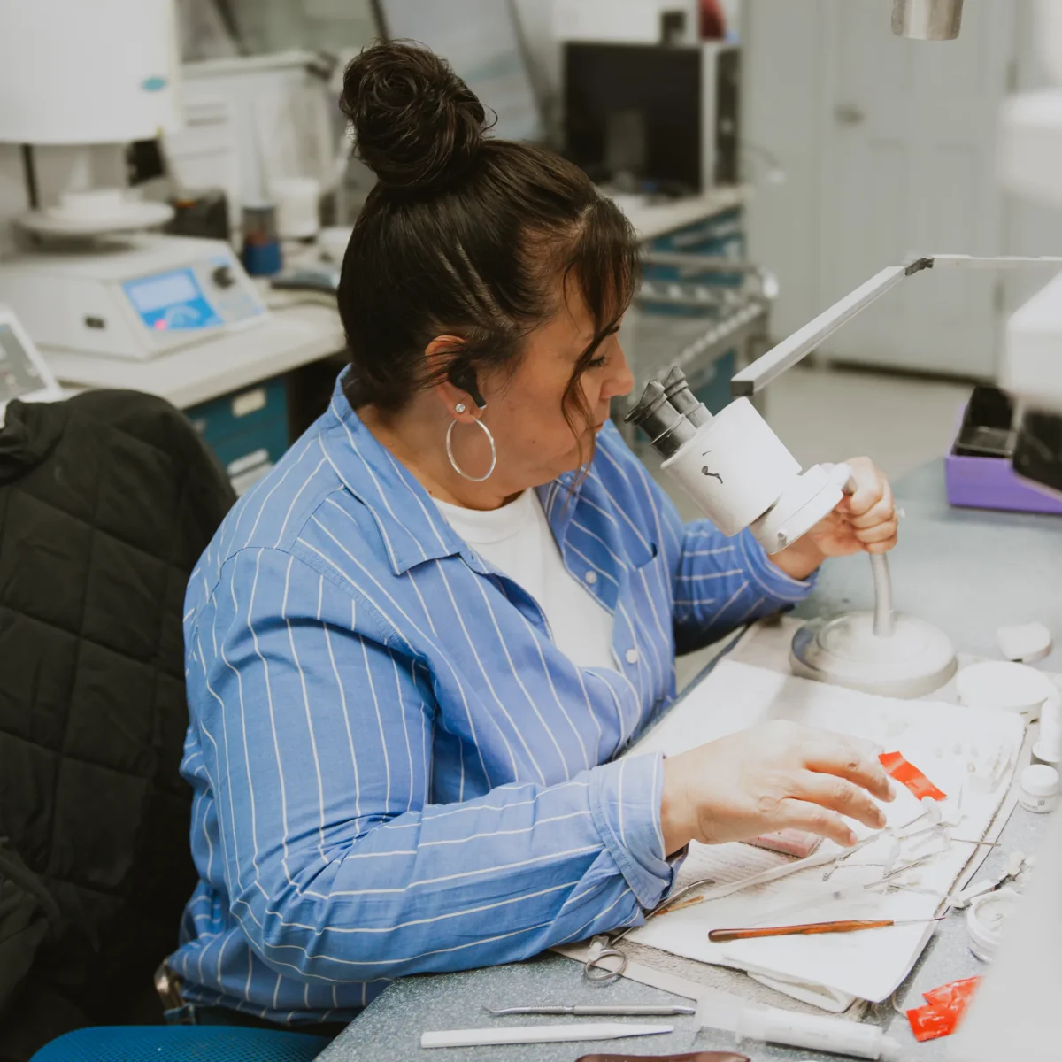 IDA technician at digital scanner workflow desk